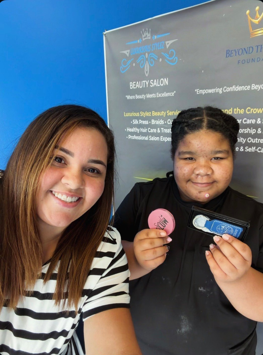 A community participant and mentor smiling after an event.